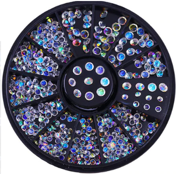 Kolotoč, kamínky, opalizující krystaly, ozdoby